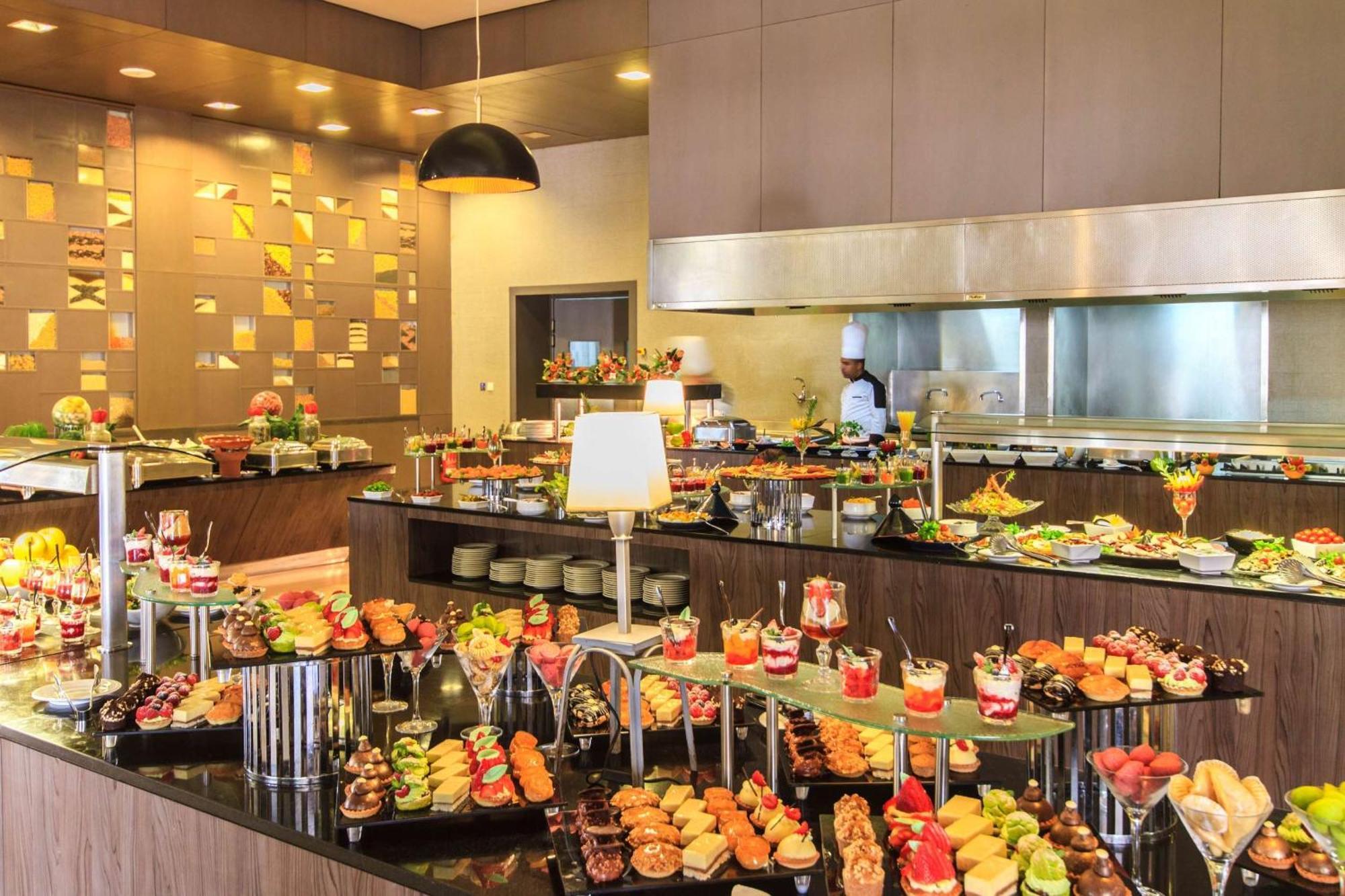 Barcelo Palmeraie Oasis Resort (Adults Only) Marrakesh Exterior photo A buffet at a hotel